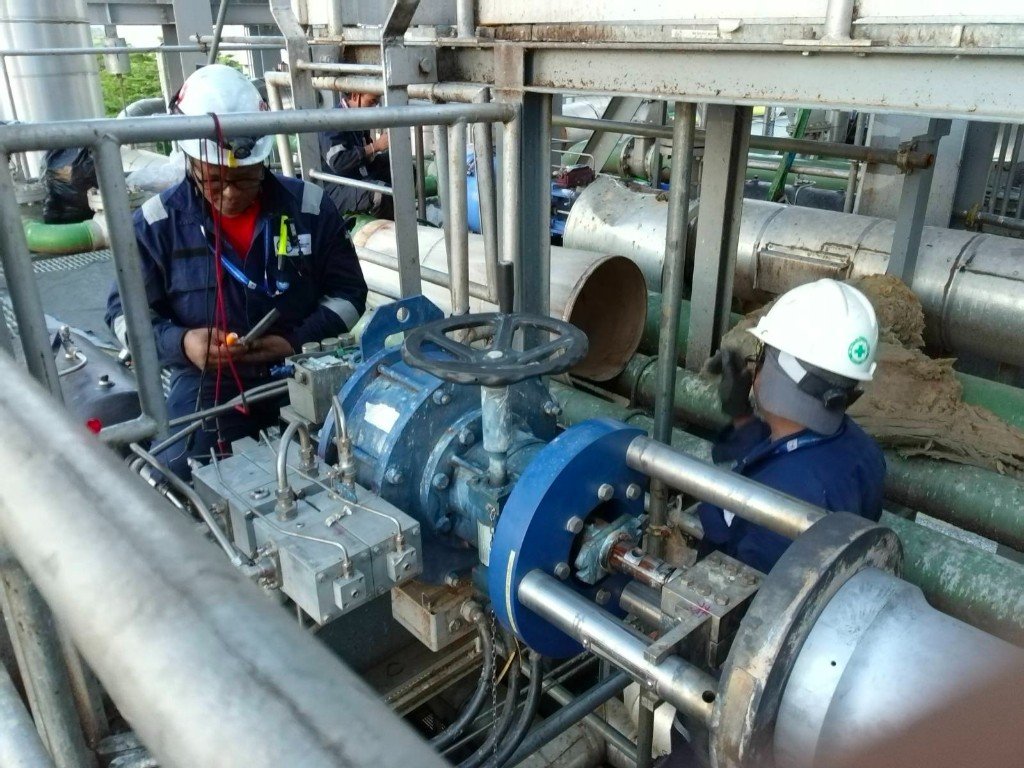 GIE team servicing a control valve actuator on-site