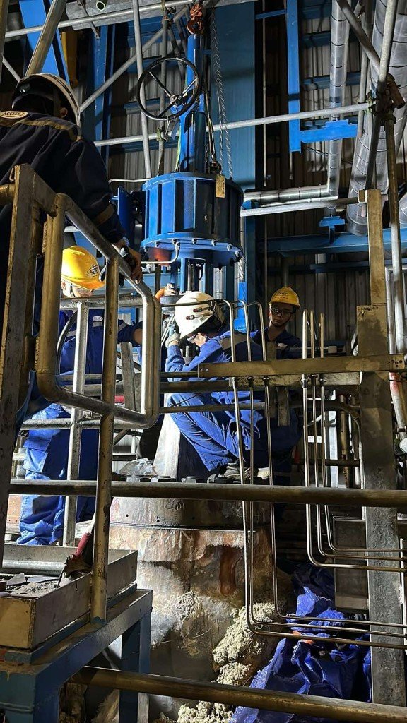 GIE team working on actuator installation at an industrial plant