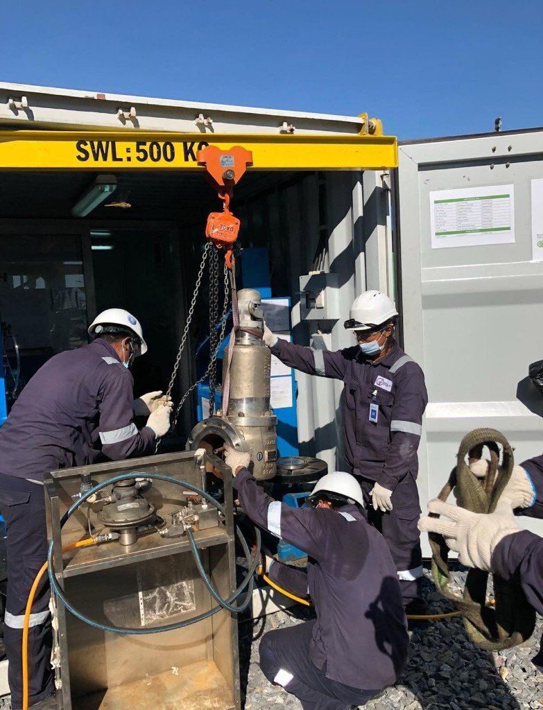 Pressure safety valve testing with chain hoist at GIE mobile workshop