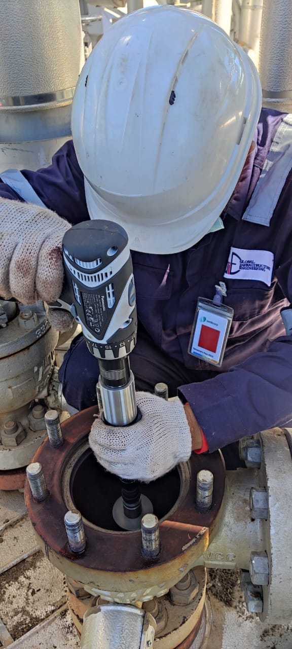 GIE engineer working on safety valve equipment